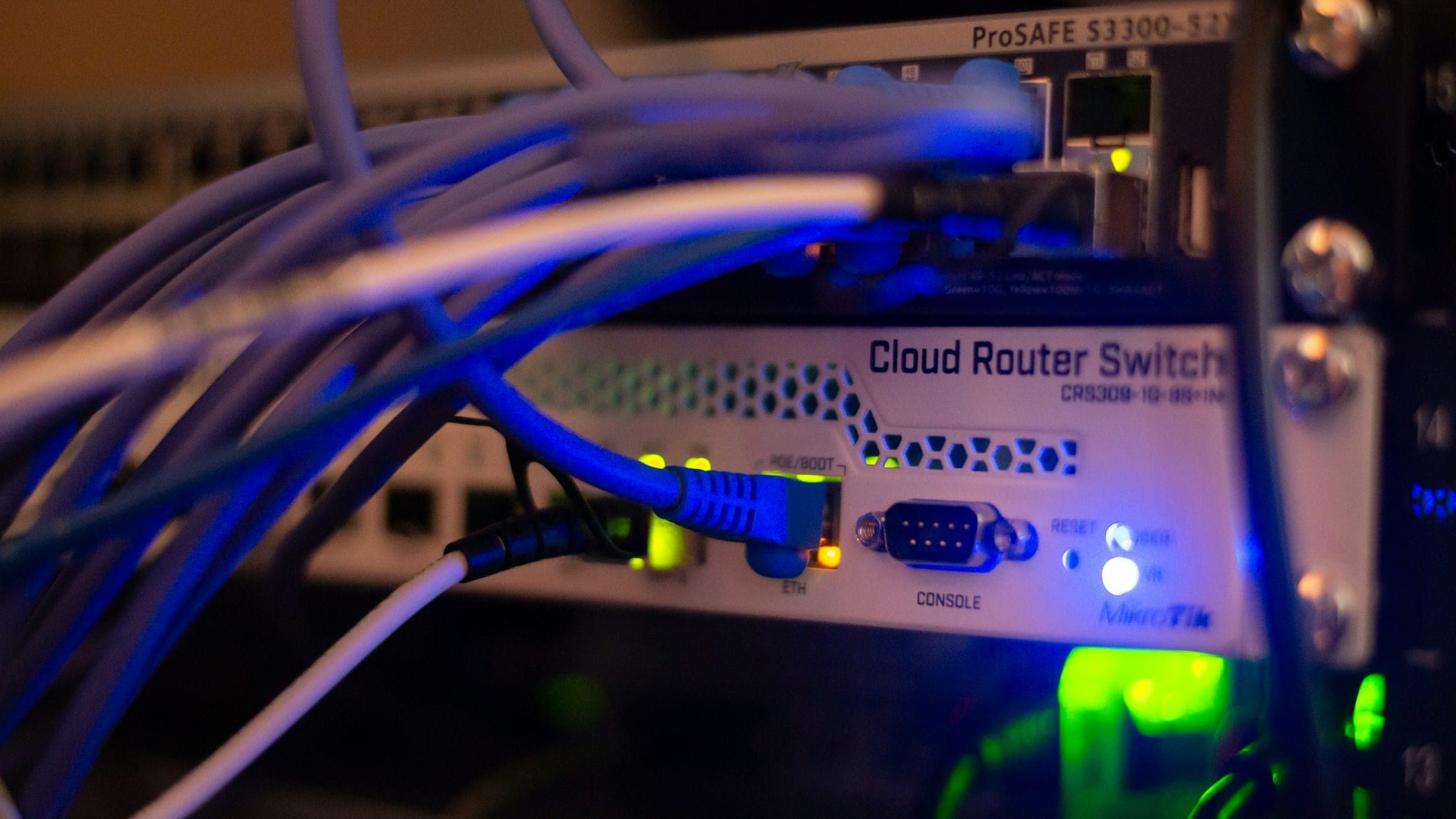 Network cables plugged into a router switch